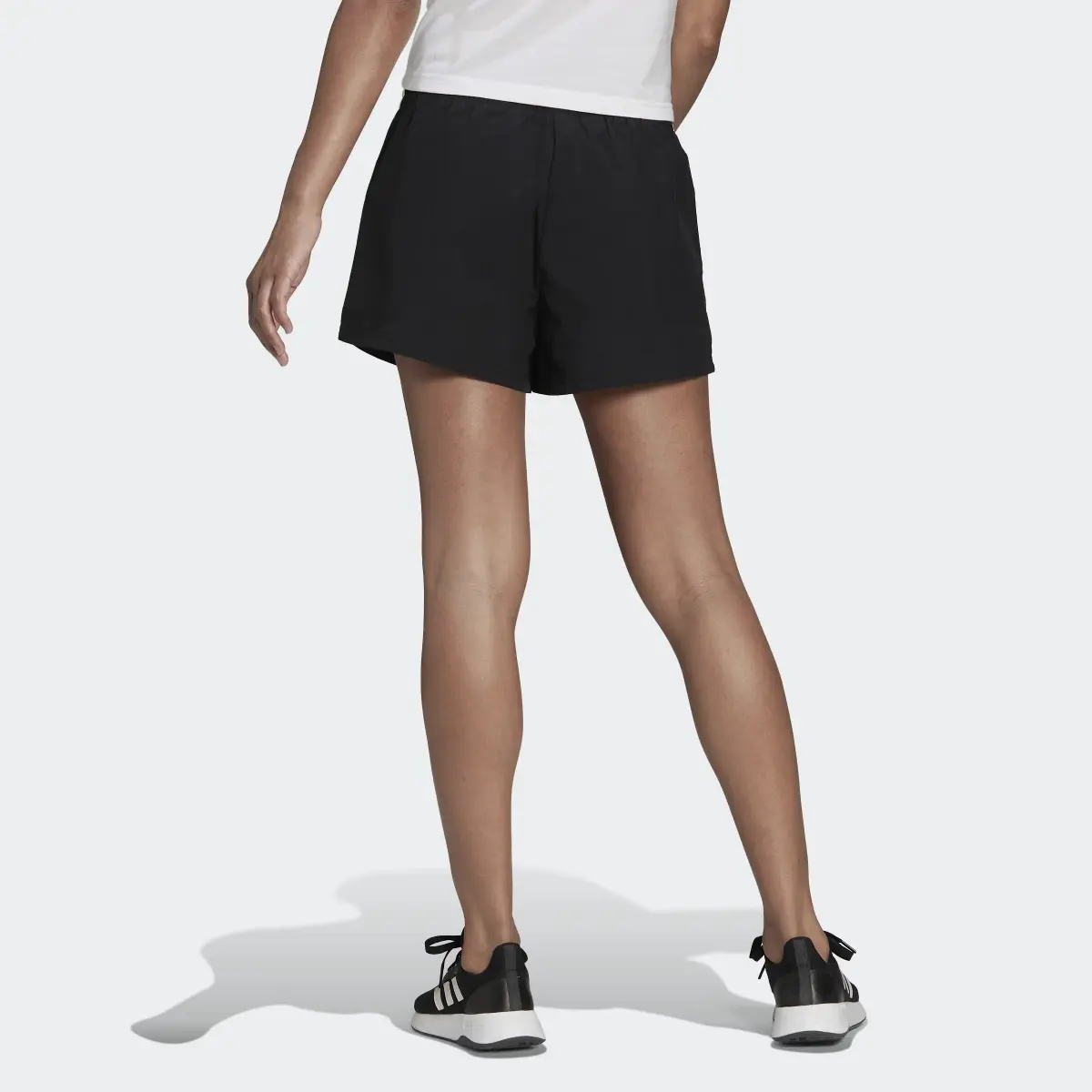 Adidas Essentials 3-Stripes Woven Shorts (Loose Fit). 2