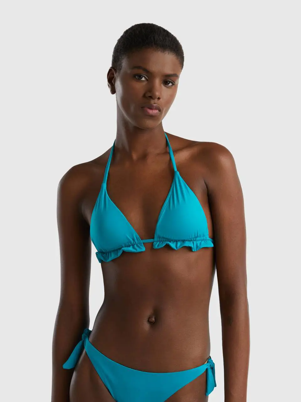 Benetton triangle bikini top in econyl® with flounces. 1