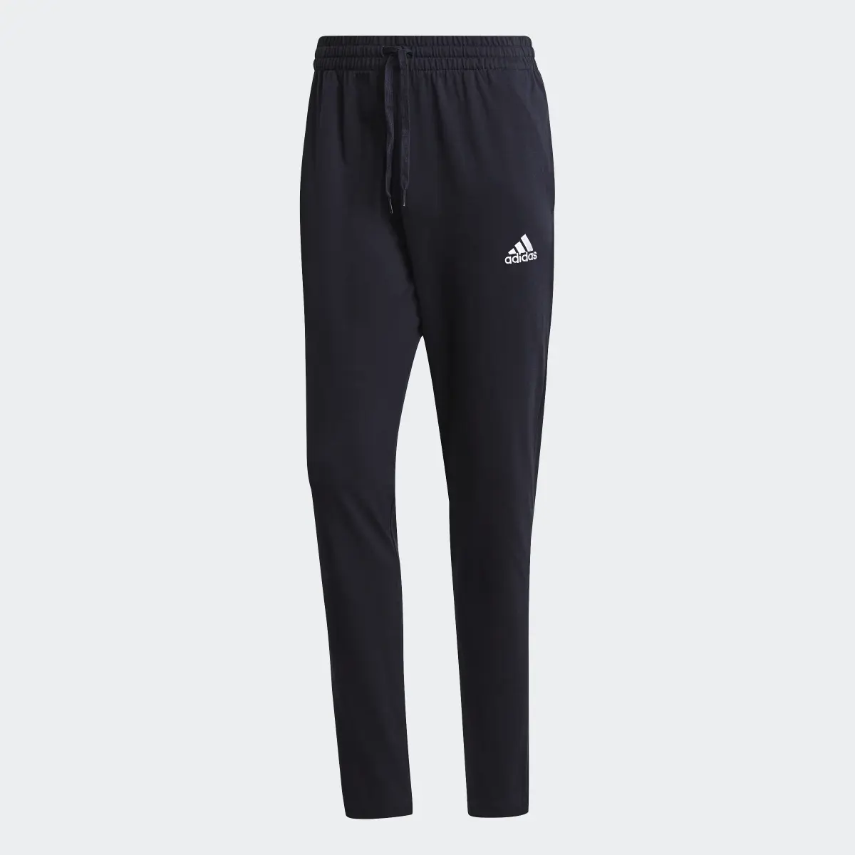 Adidas Essentials Tapered Joggers. 1