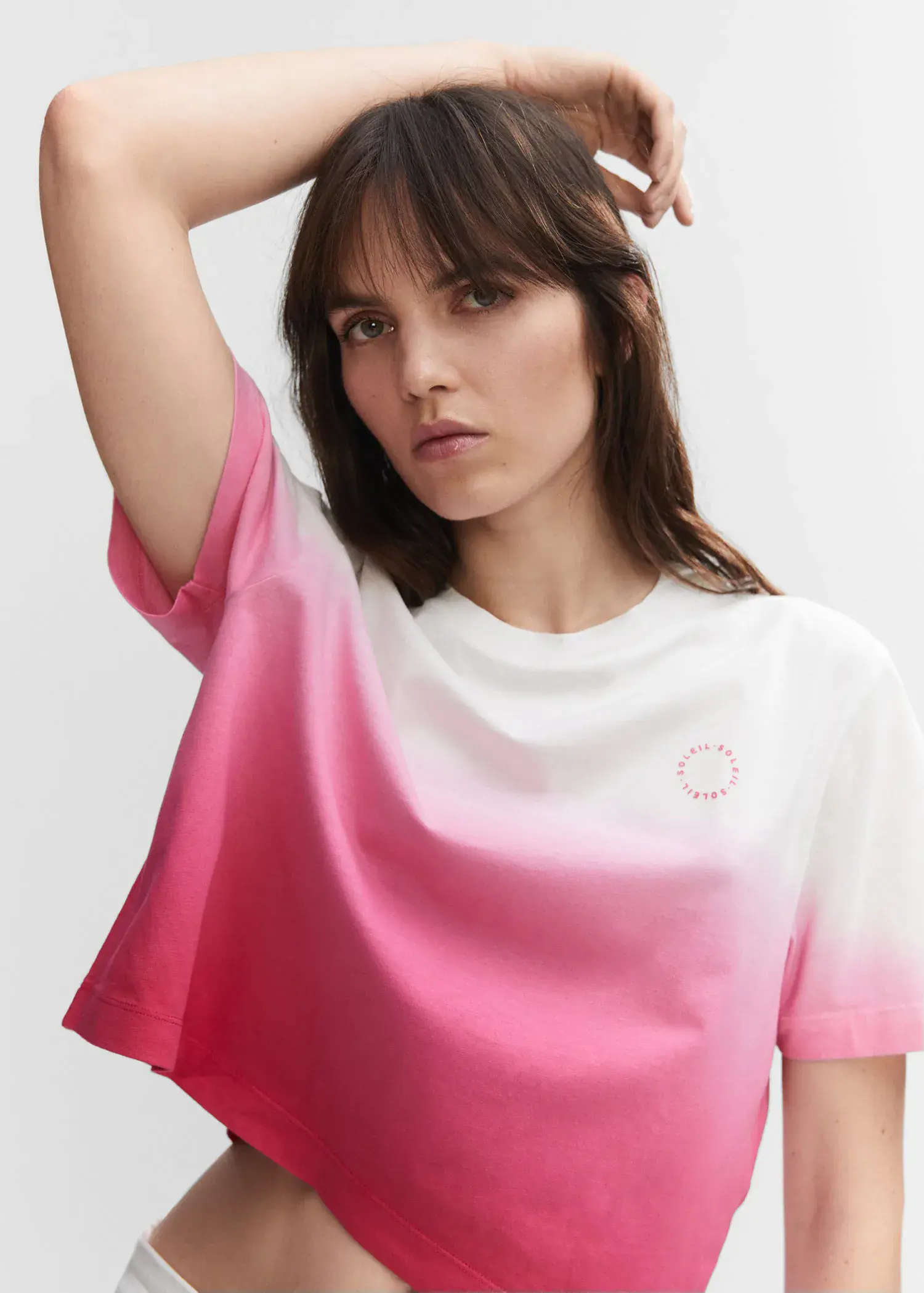 Mango Cotton ombré t-shirt. a woman in a pink and white t-shirt. 