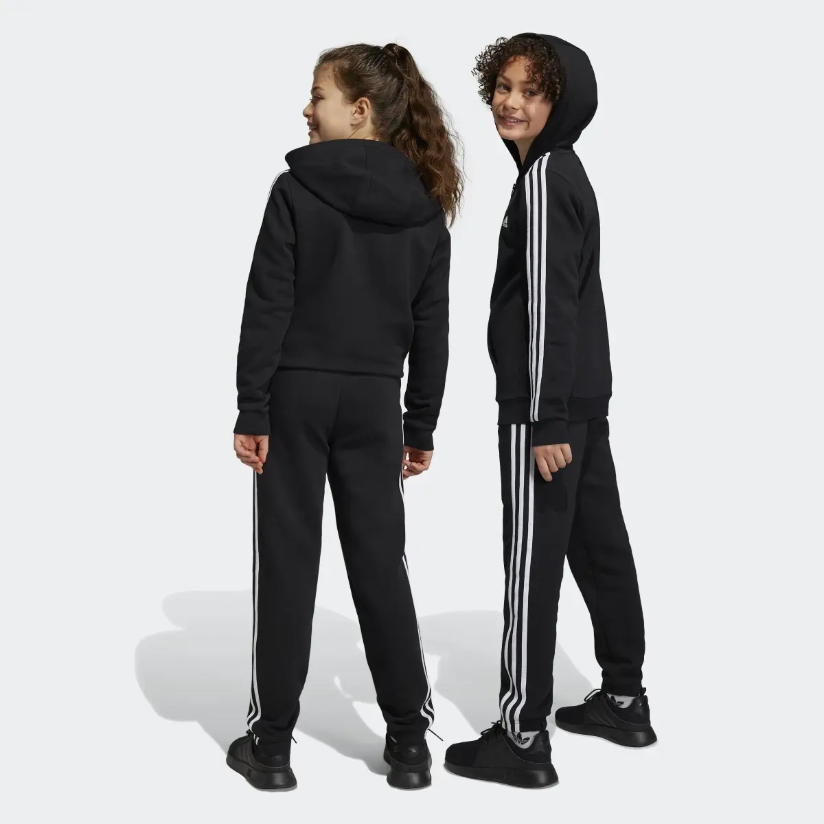 Adidas Essentials 3-Stripes Fleece Joggers. 2