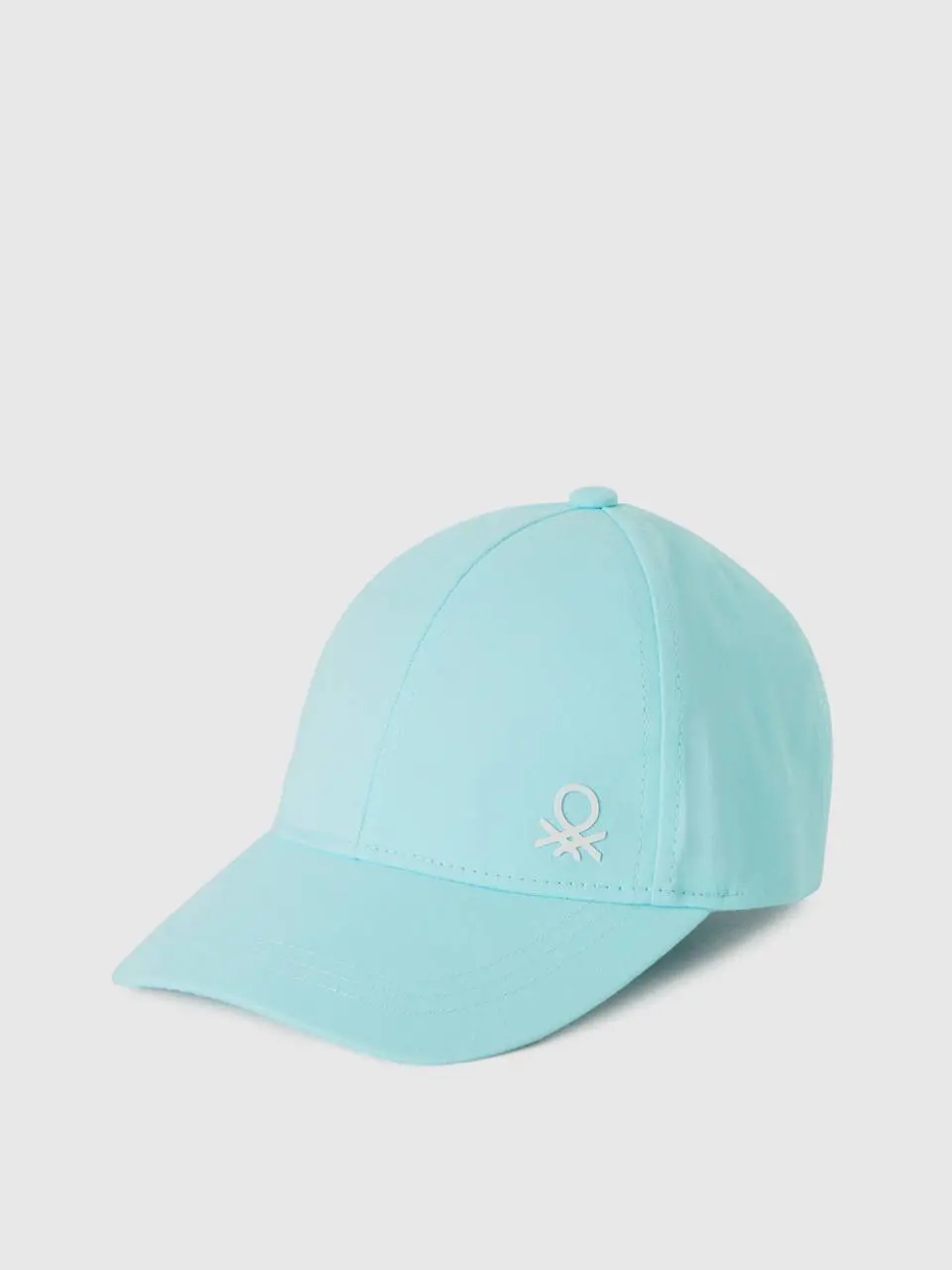 Benetton cap with visor. 1