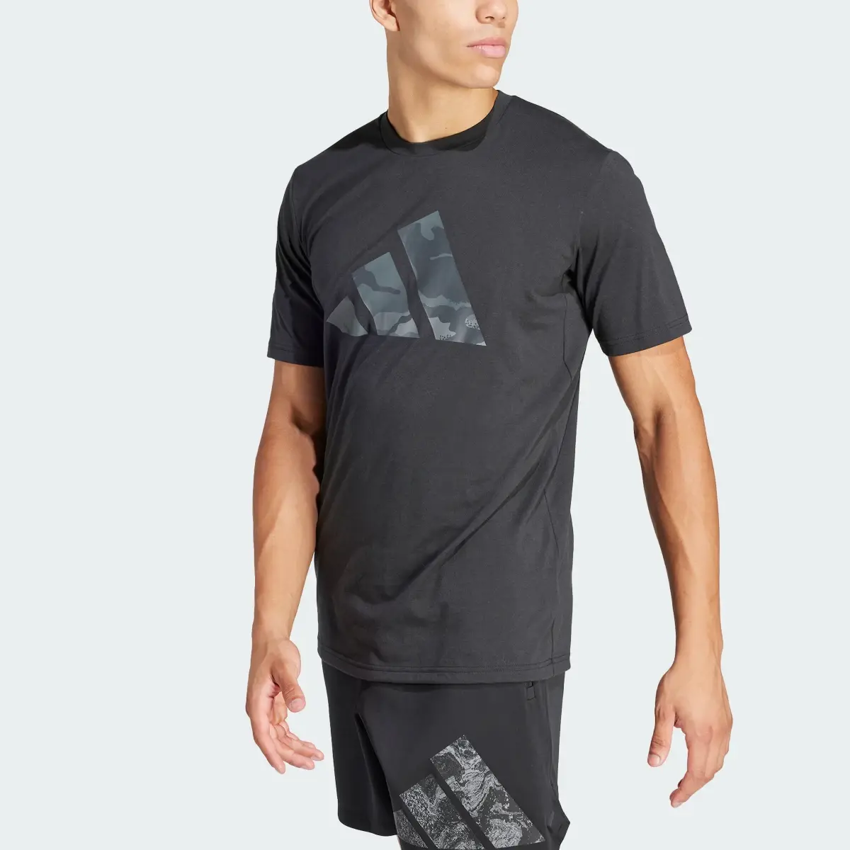 Adidas Train Essentials Seasonal Brand Love Camo Tee. 1