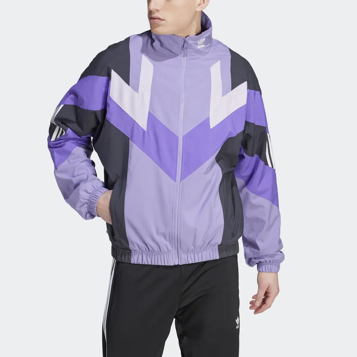 Adidas Rekive Woven Track Jacket. 1