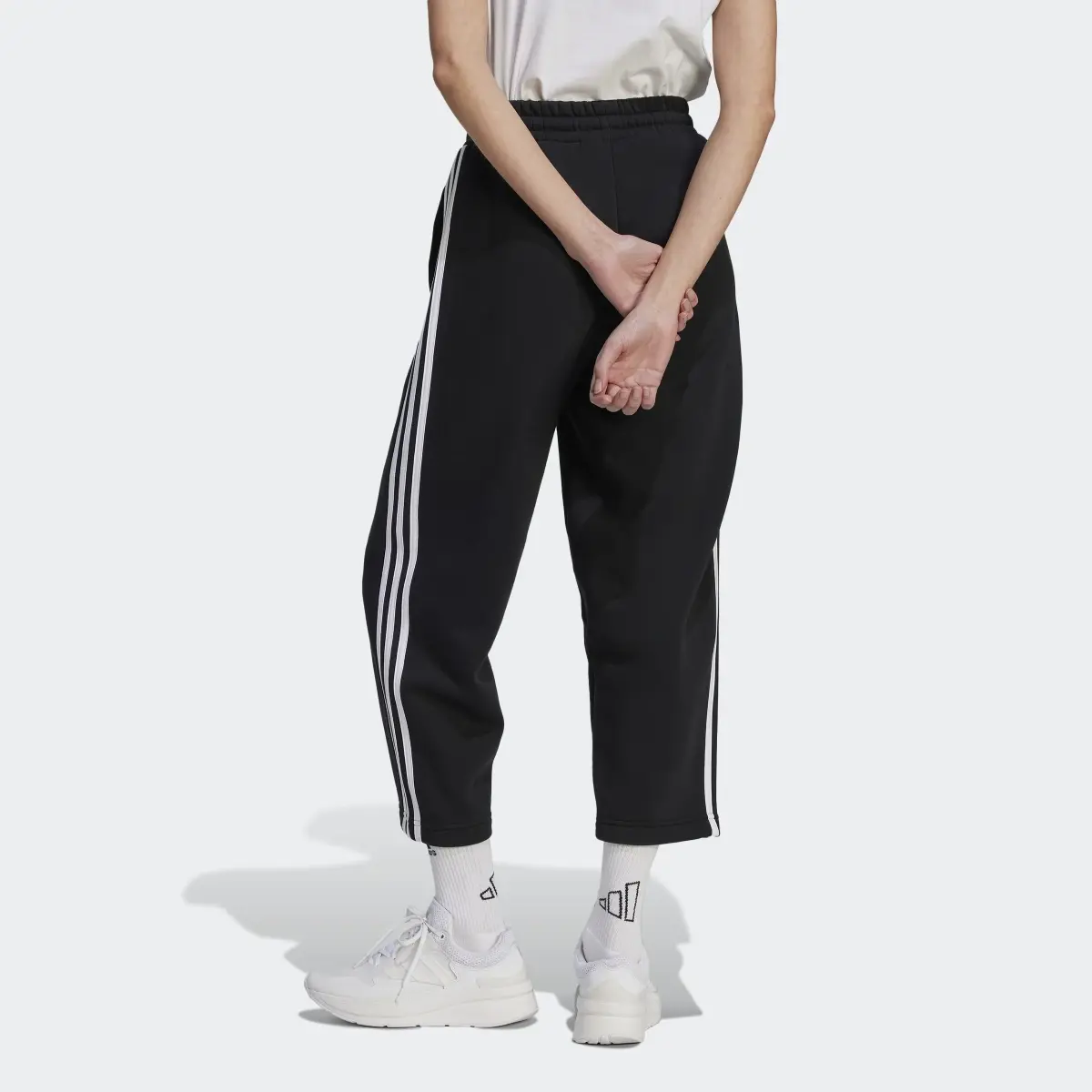 Adidas Essentials 3-Stripes Open Hem Fleece Pants. 2