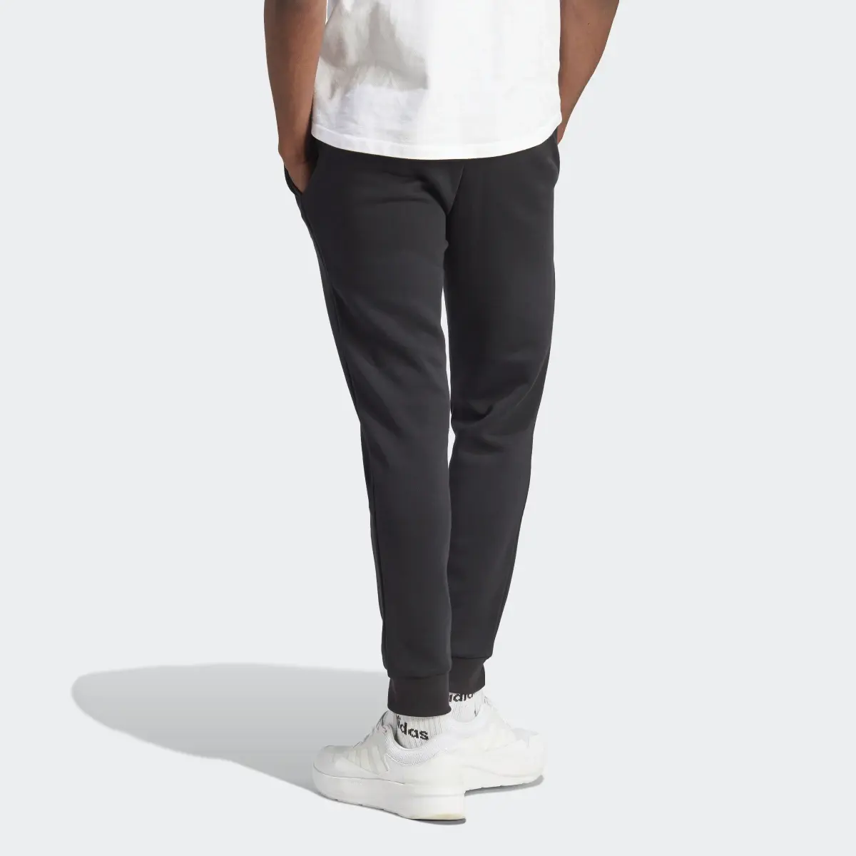 Adidas Essentials Fleece Tapered Cuffed Pants. 2