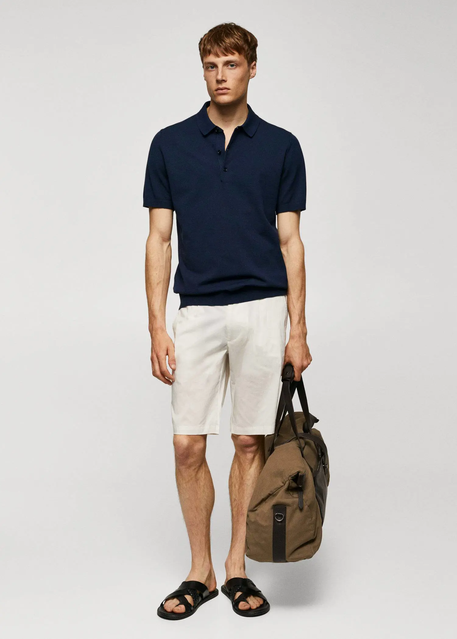 Mango Fine-knit polo shirt. a man in shorts and a polo shirt. 