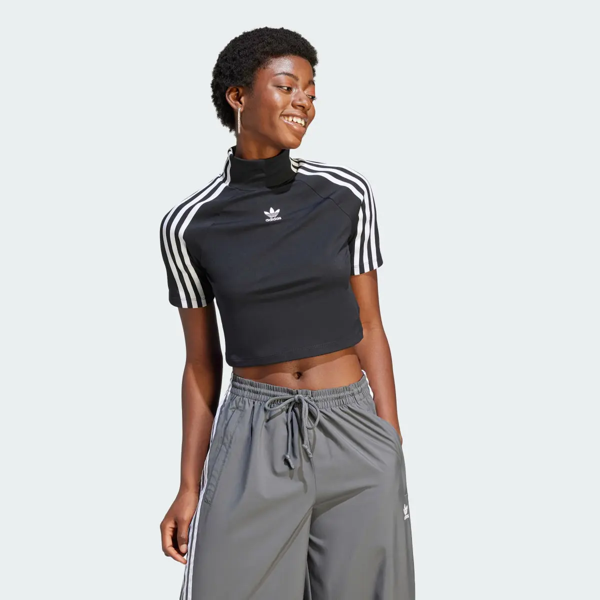 Adidas TIGHT SS TOP. 2