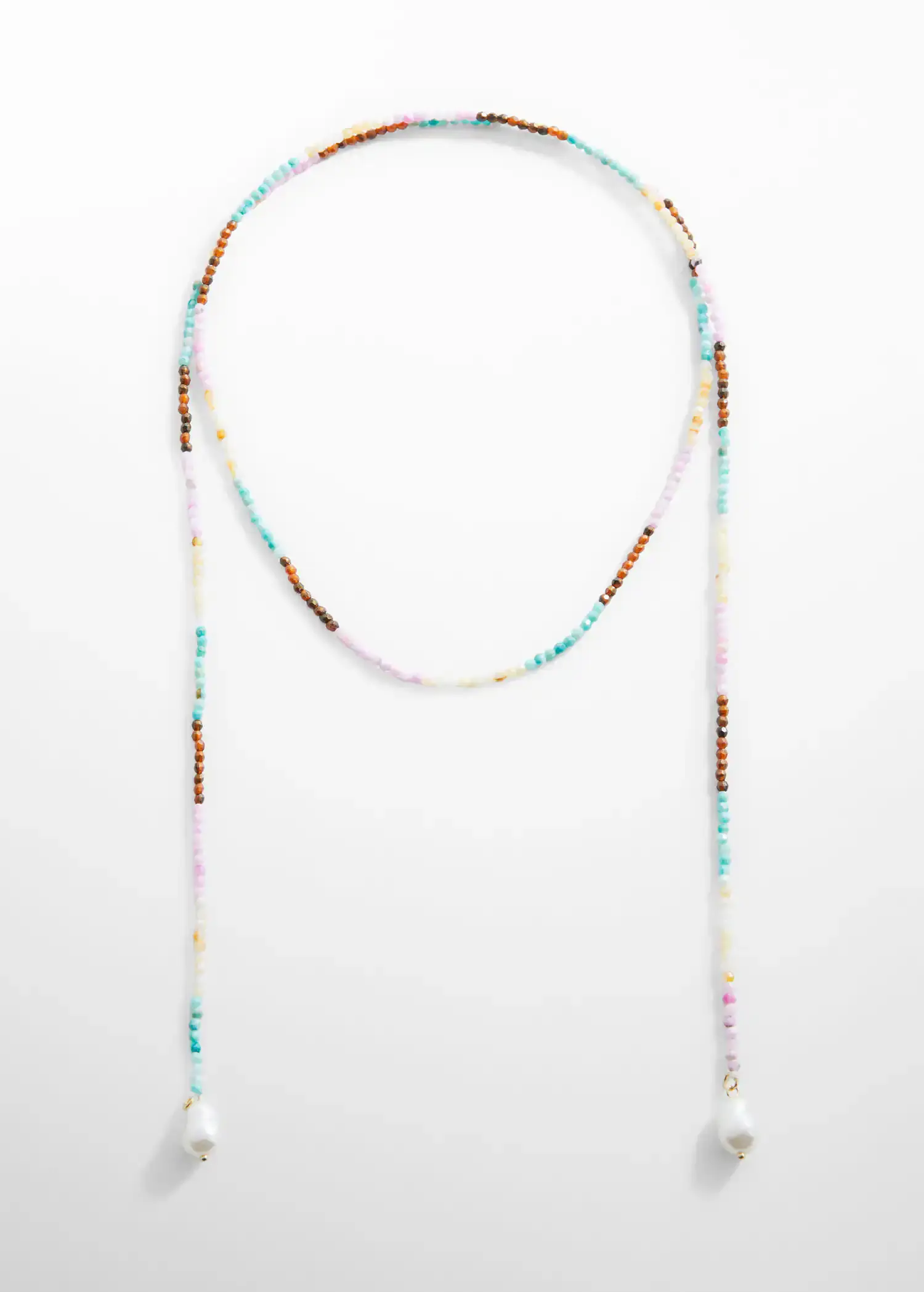 Mango Mixed bead necklace. a long necklace with beads on a white surface. 