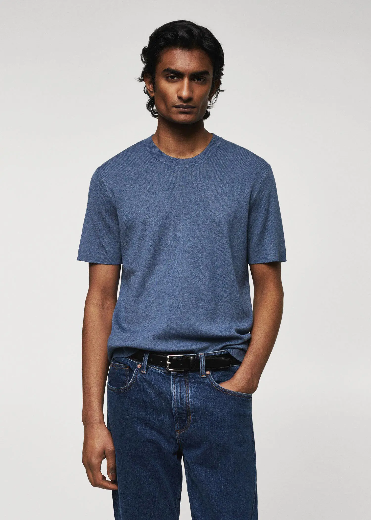 Mango Cotton fine-knit t-shirt. a man wearing a blue shirt and jeans. 