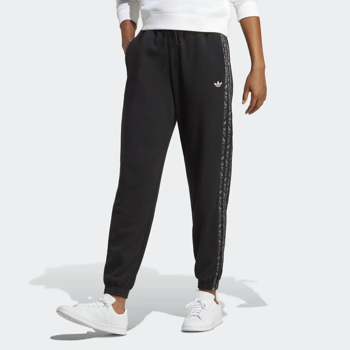 Adidas Pantalon de survêtement avec imprimé animal abstrait. 1