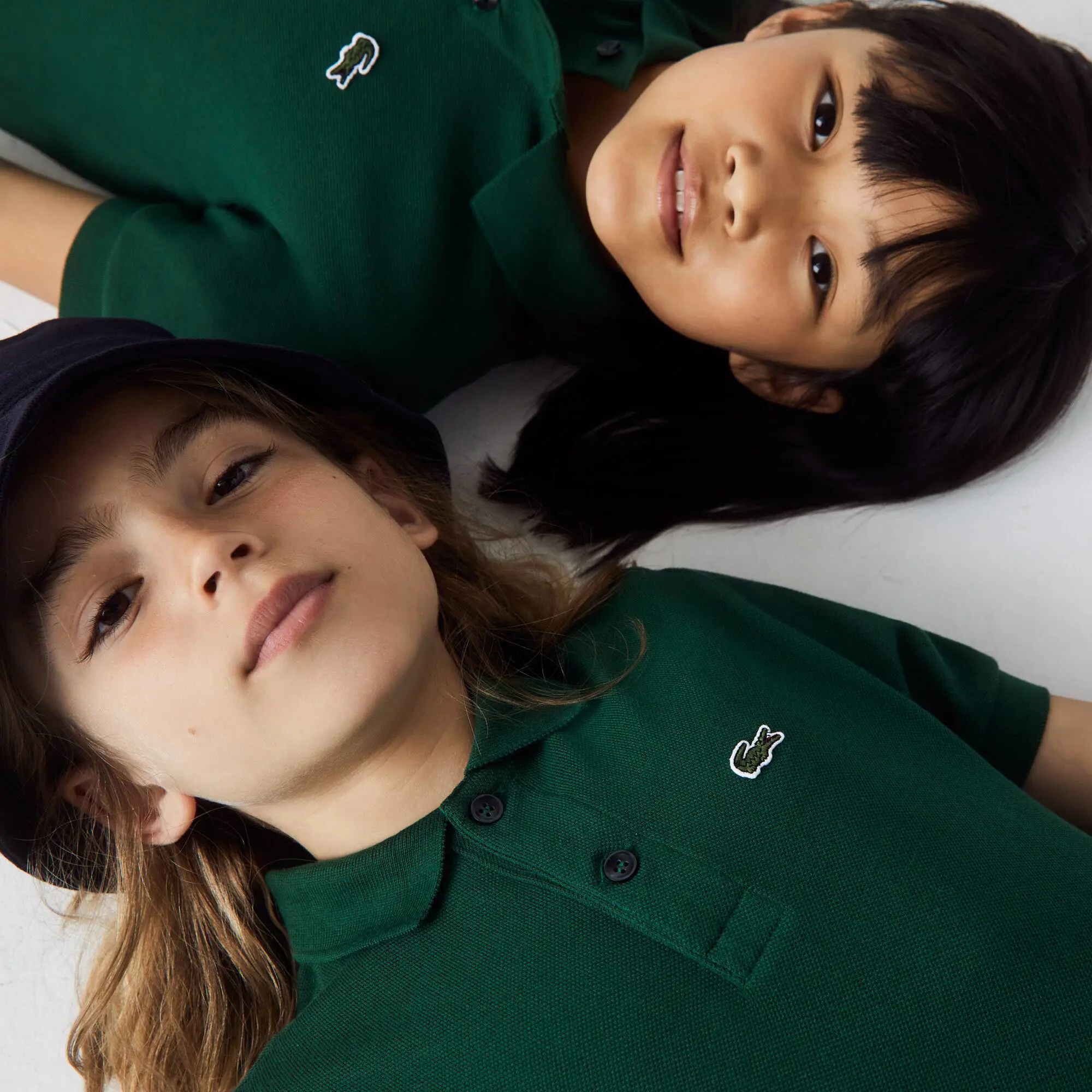 Lacoste Kids' Regular Fit Petit Piqué Polo. 1