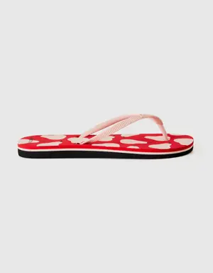 red flip flops with pear pattern