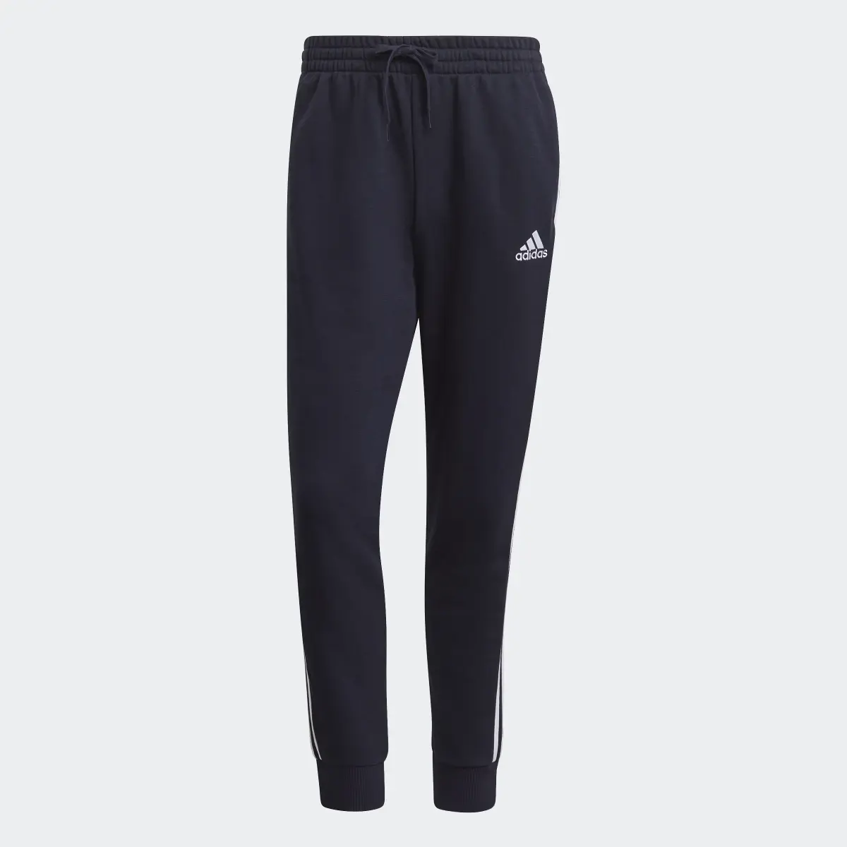 Adidas Essentials French Terry Tapered Cuff 3-Streifen Hose. 1