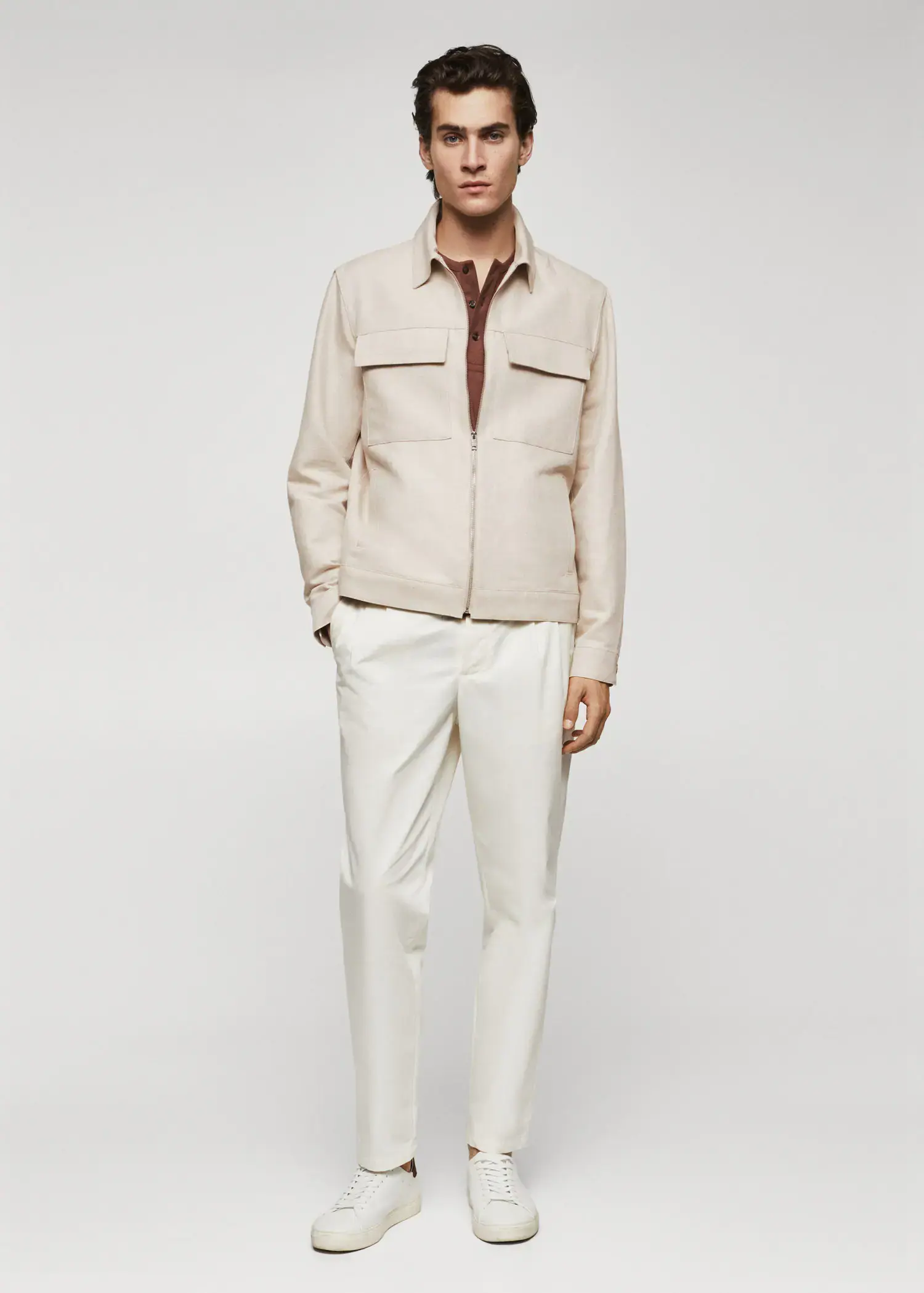 Mango Pocket linen-blend jacket. a man in a white suit standing in front of a wall. 