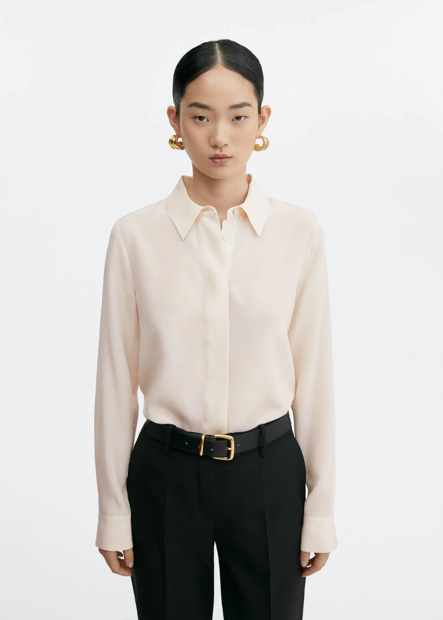 Mango Silk shirt with linear seams . 1