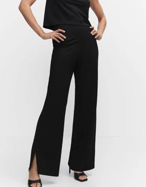 Straight trousers with openings