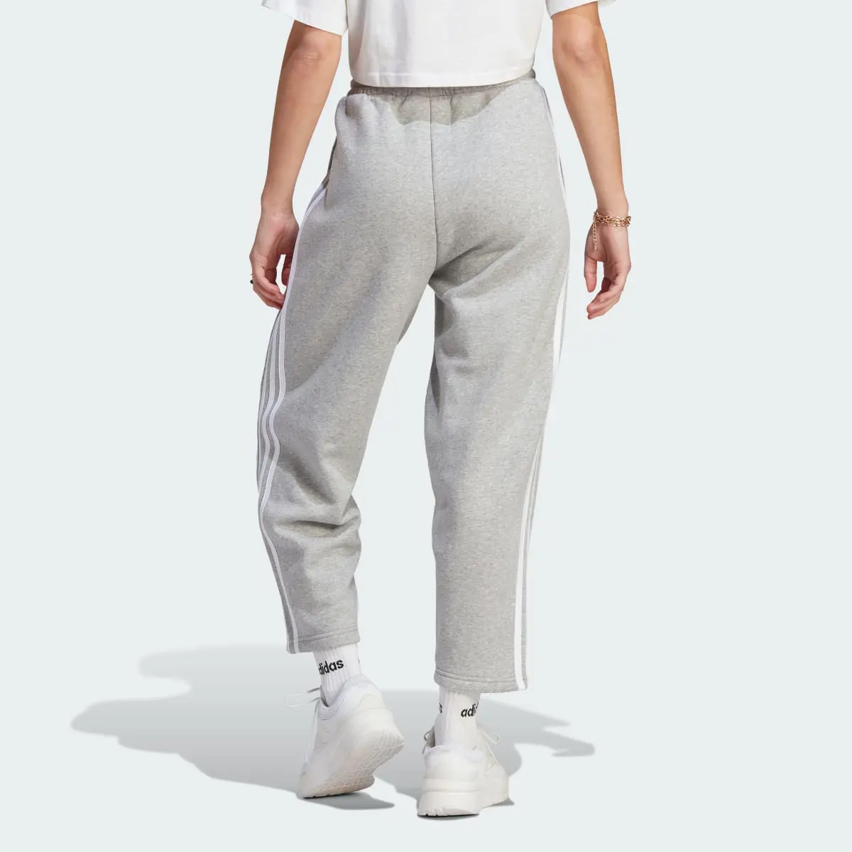 Adidas Essentials 3-Stripes Open Hem Fleece Pants. 2