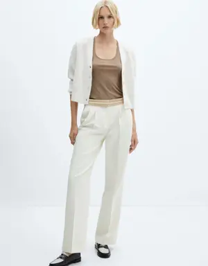 Pleated trousers with turn-up waist 