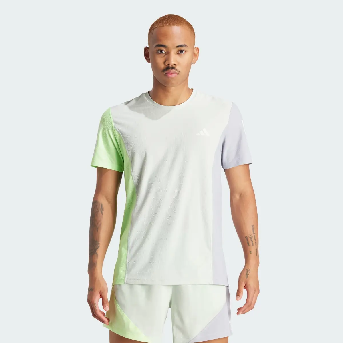 Adidas Playera Own The Run Colorblock. 2