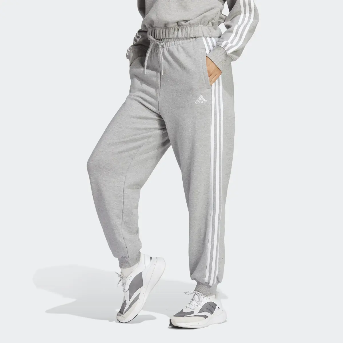 Adidas Pants Essentials 3 Franjas Tela French Terry Ajuste Holgado. 1