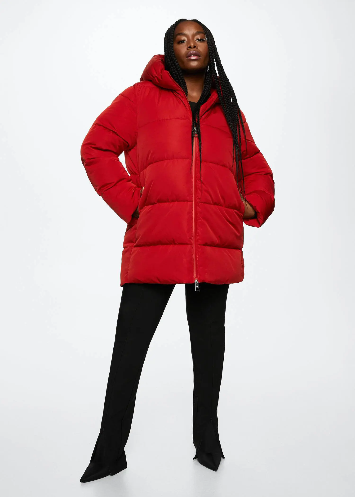 Mango Hood quilted coat. a person wearing a red jacket and black pants. 