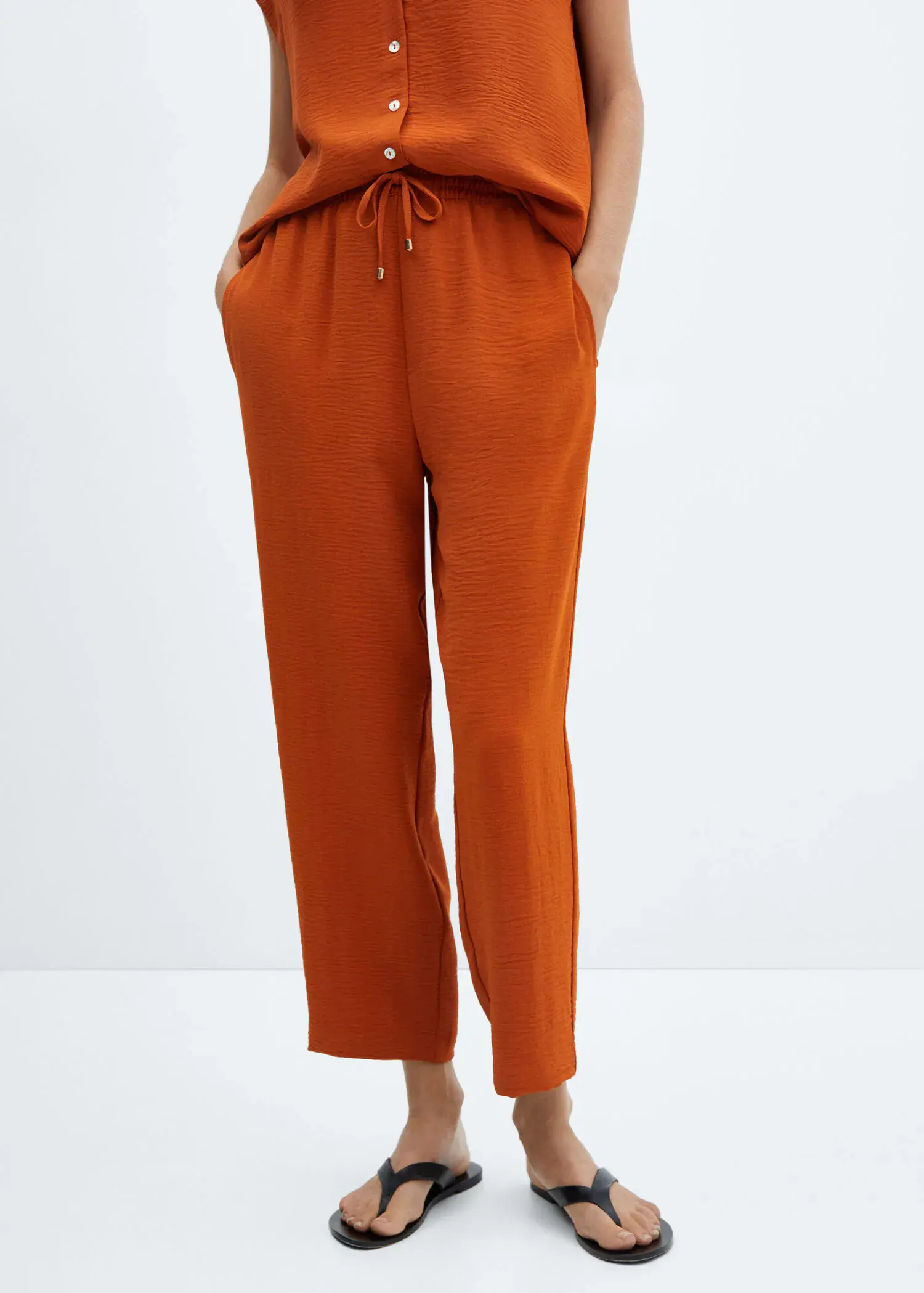 Mango Flowy jogger trousers. 1