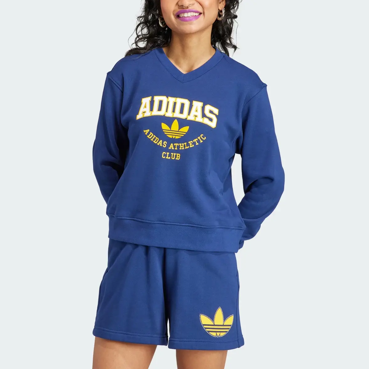 Adidas College Graphic Sweatshirt. 1