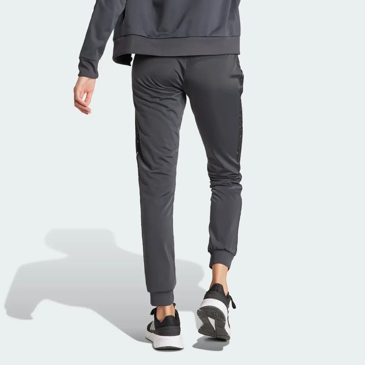 Adidas Essentials Animal Print Tricot 3-Stripes Slim Tapered Track Pants. 2