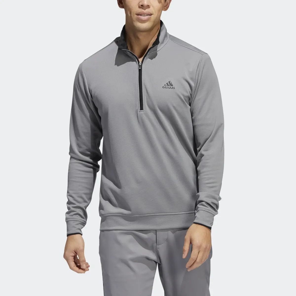 Adidas Quarter-Zip Golf Pullover. 1