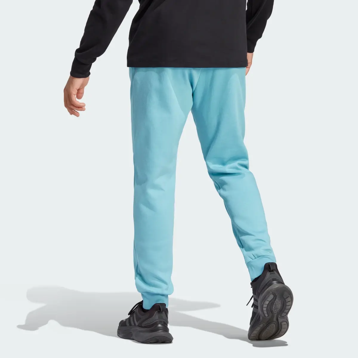 Adidas Essentials Fleece Regular Tapered Pants. 2