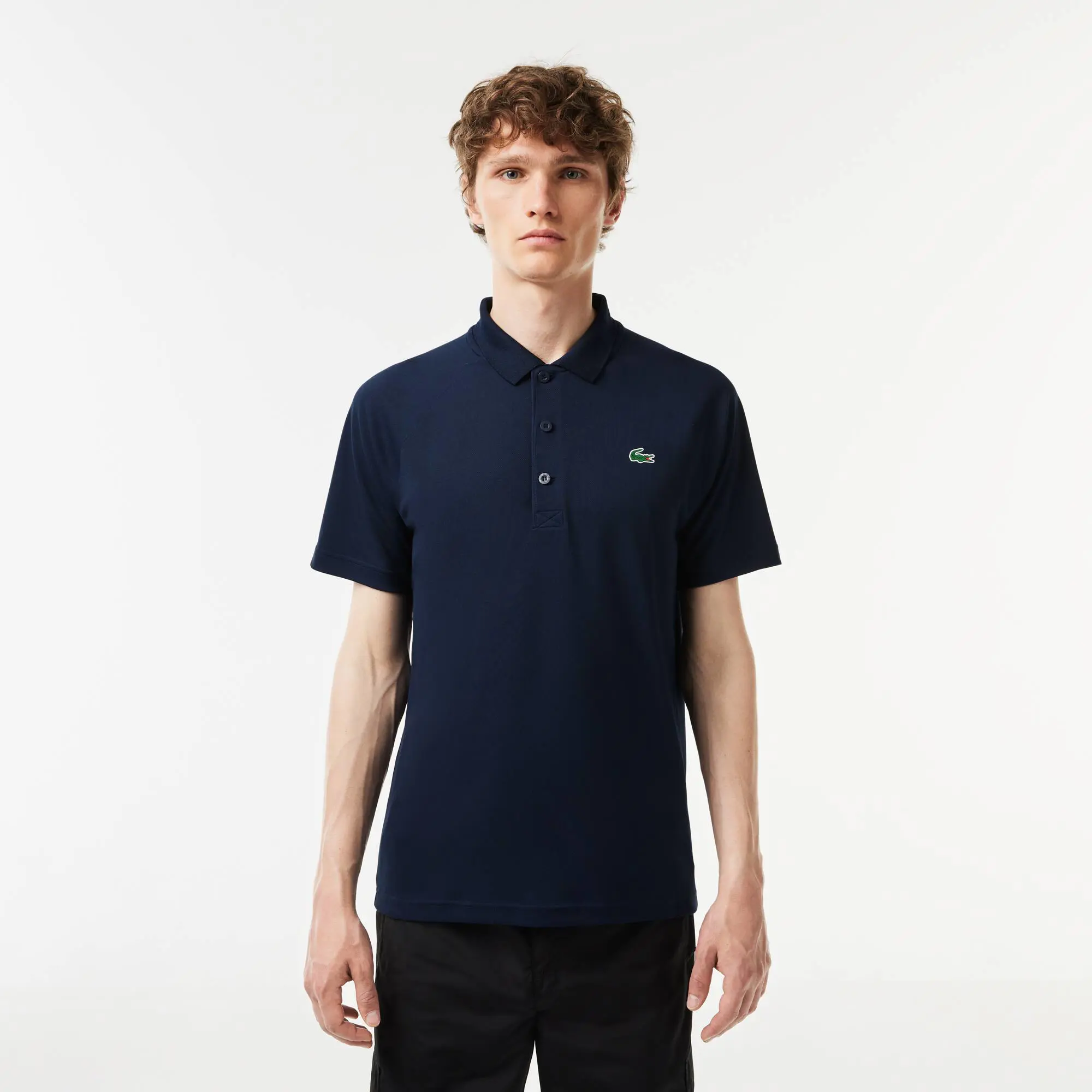 Lacoste Men's Lacoste SPORT Breathable Run-Resistant Interlock Polo Shirt. 1