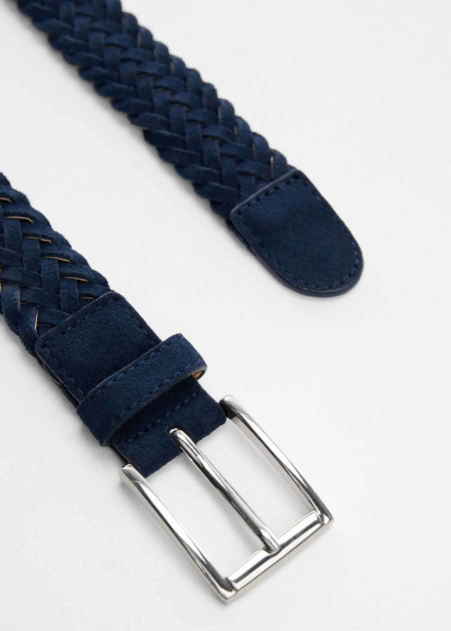 Mango Braided suede belt. a close-up of a blue belt with a silver buckle. 