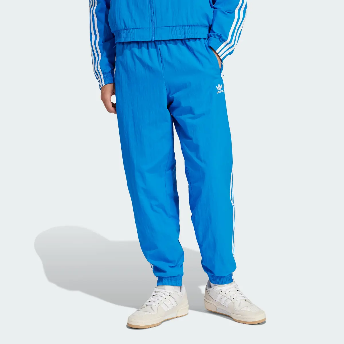 Adidas Adicolor Woven Firebird Track Pants. 1