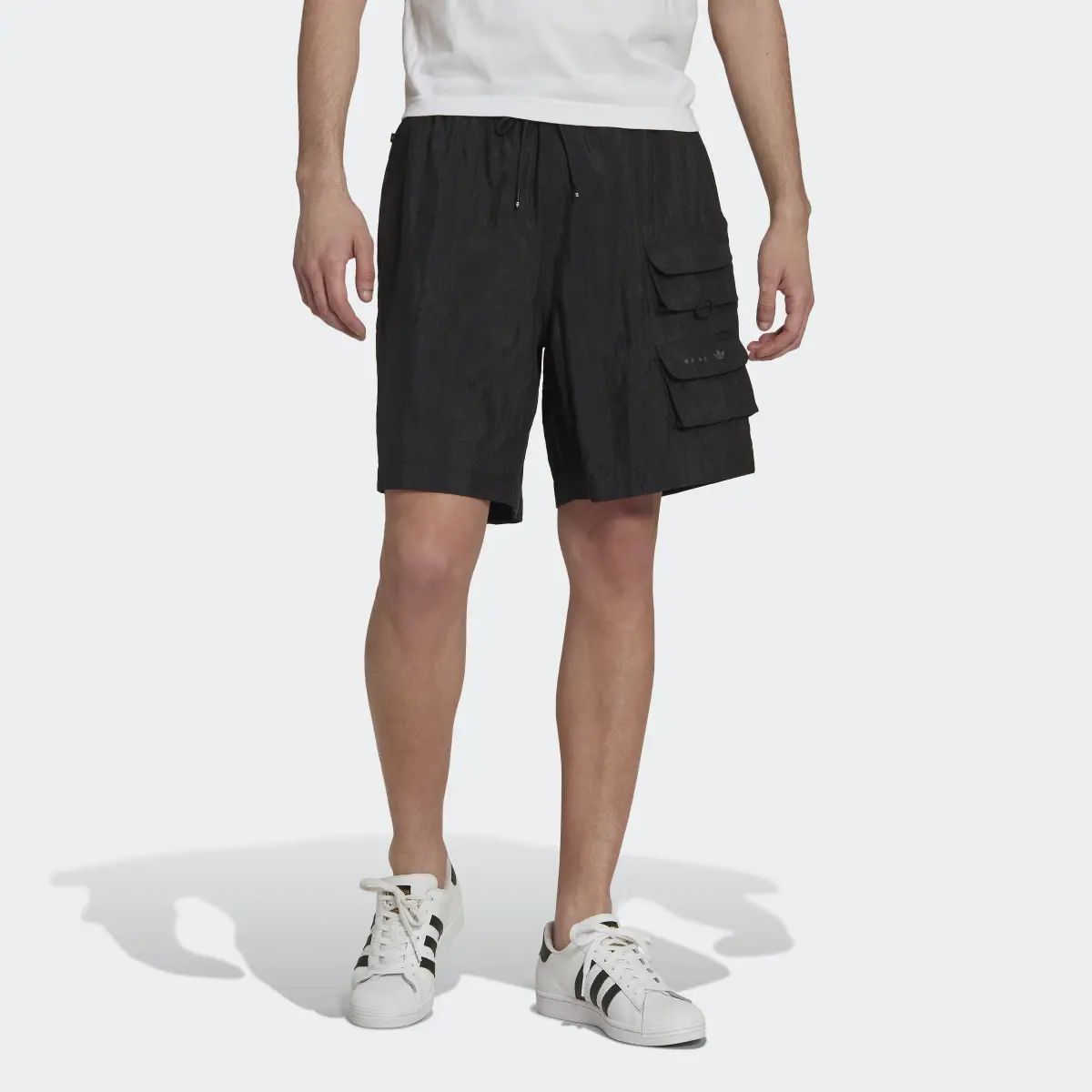 Adidas Reveal Material Mix Shorts. 1