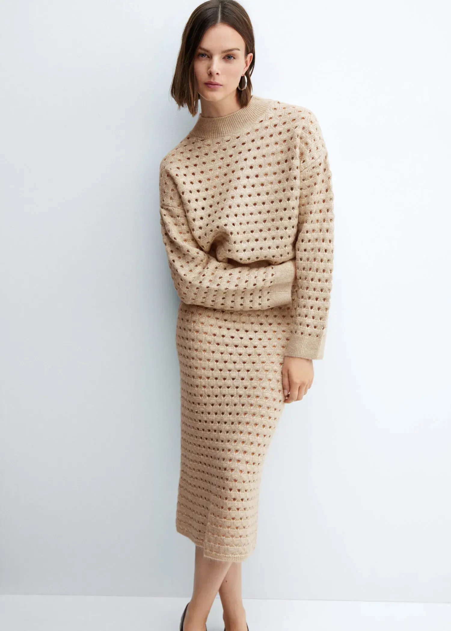 Mango Knitted skirt with openwork details. 1