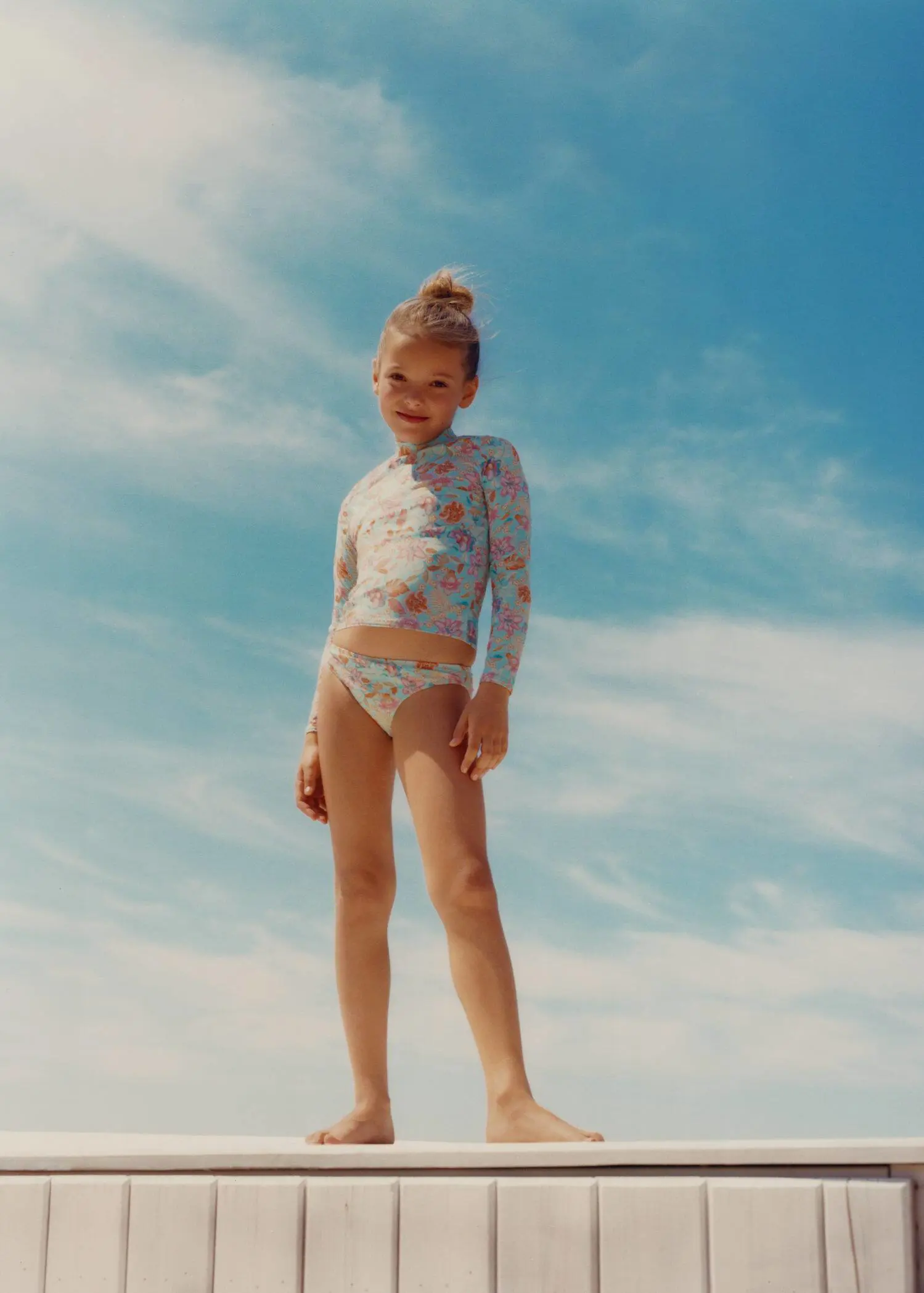 Mango Printed long sleeve t-shirt. a young girl standing on the beach in her underwear. 