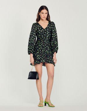 Short gathered dress with a floral print