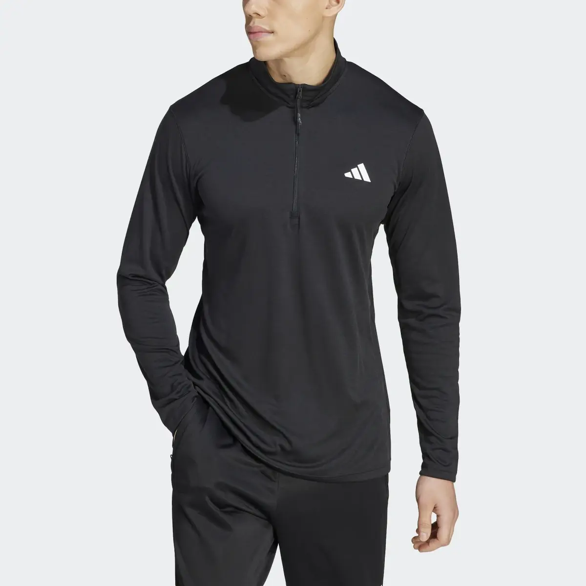 Adidas Train Essentials Seasonal Training 1/4-Zip Long Sleeve Tee. 1