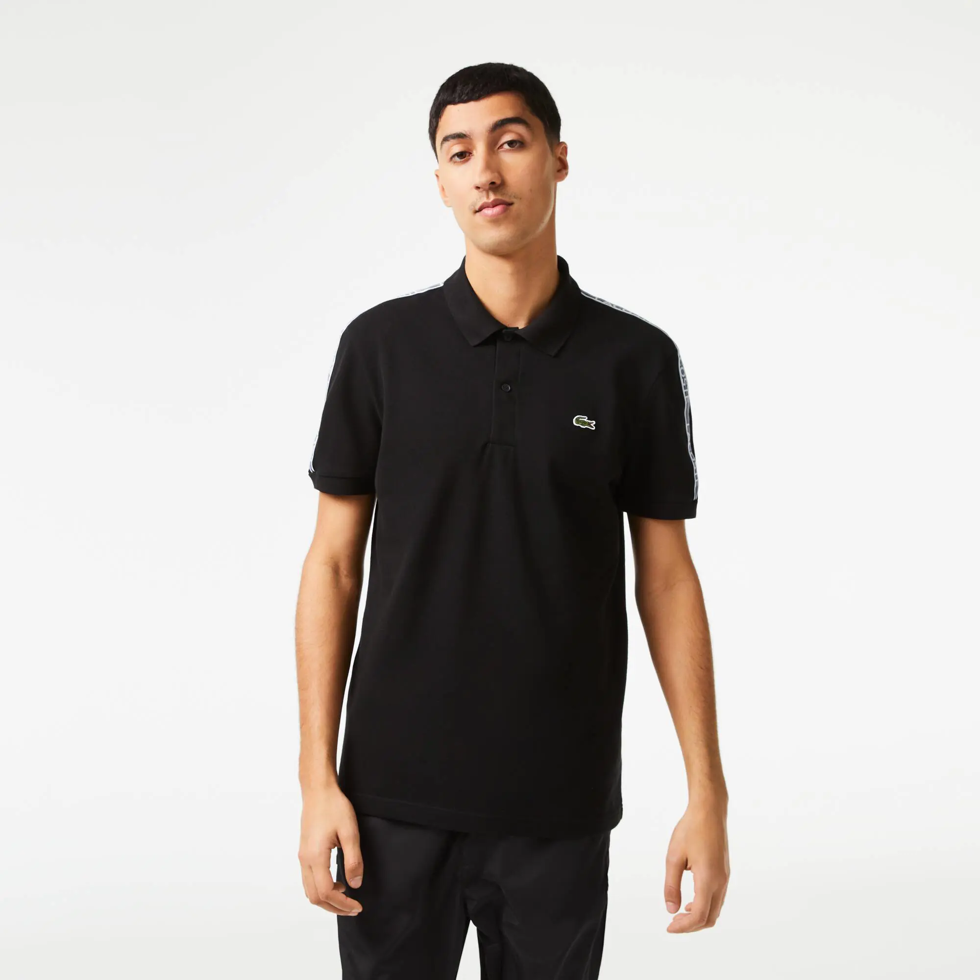 Lacoste Herren LACOSTE Poloshirt aus Piqué mit Logostreifen. 1