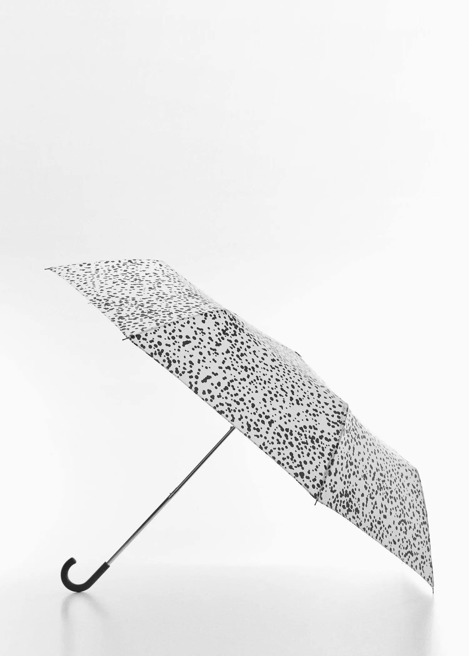 Mango Print folding umbrella. an umbrella is open in the sky on a sunny day. 