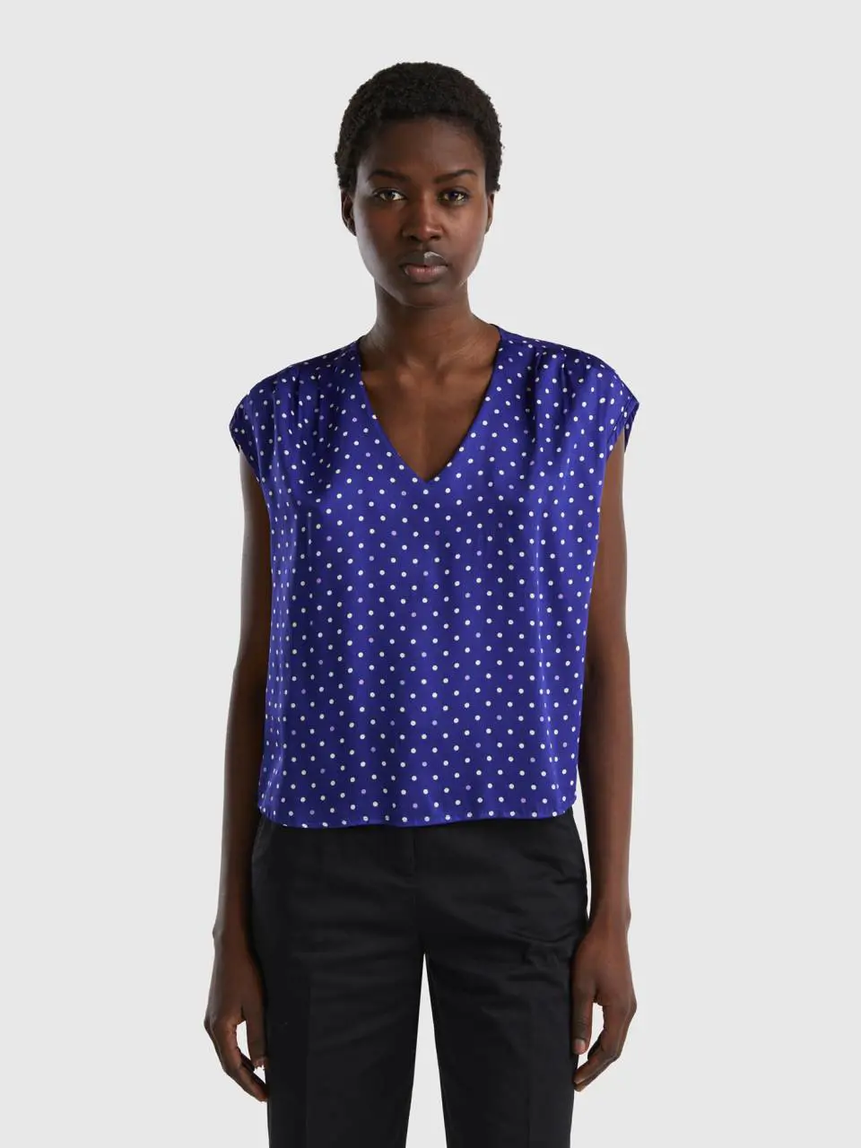 Benetton short sleeve patterned blouse. 1