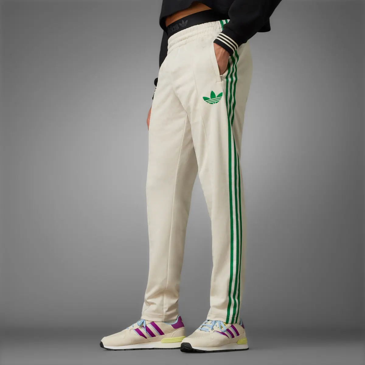 Adidas Adicolor 70s Monogram Track Pants. 1