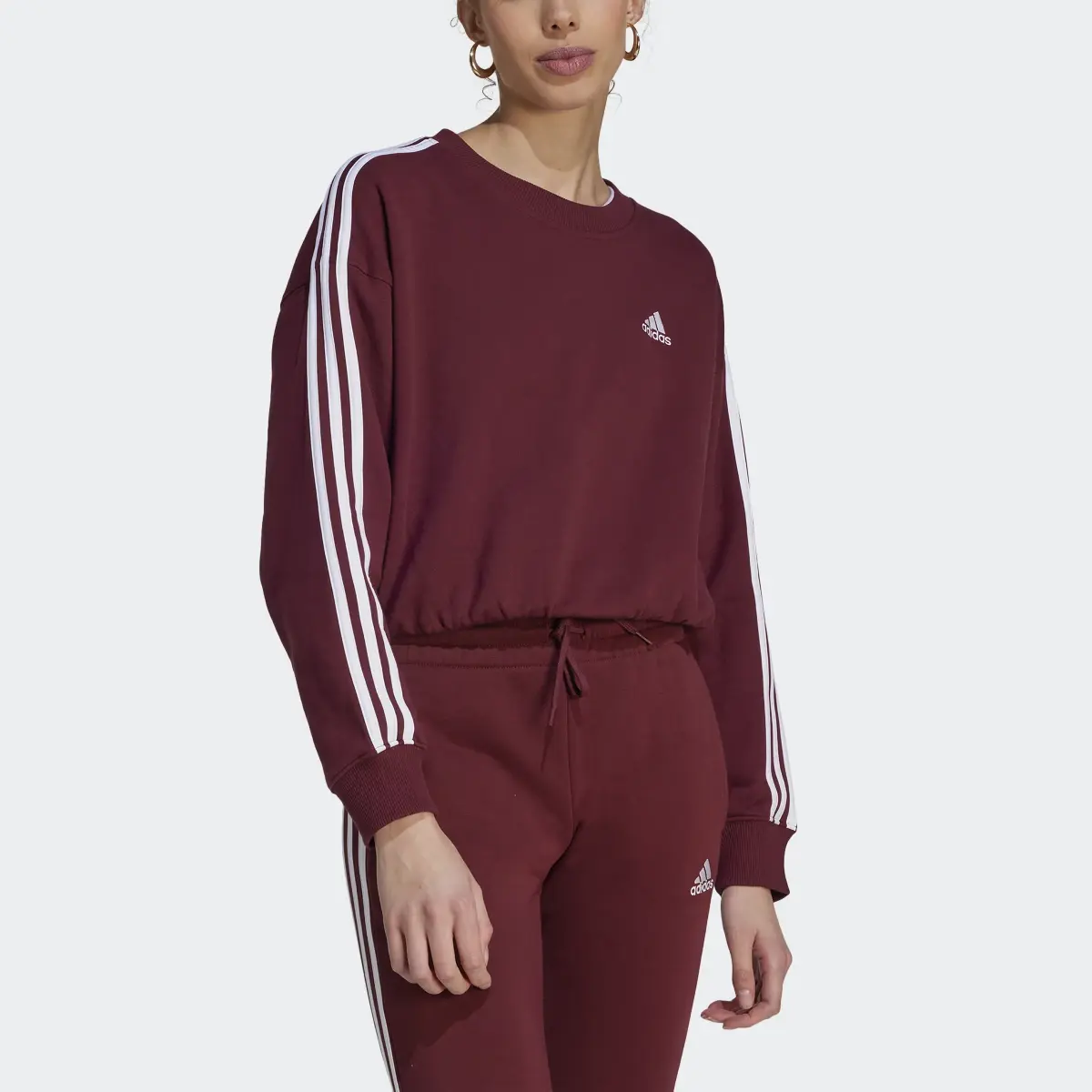 Adidas Sudadera corta Essentials 3 bandas. 1