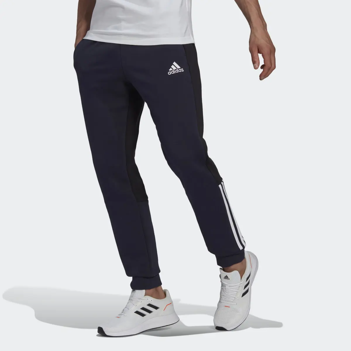 Adidas Essentials Colorblock Fleece Joggers. 1