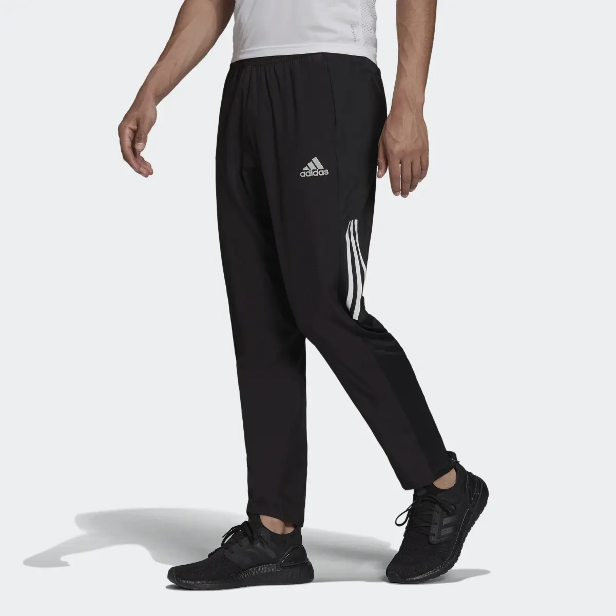 Adidas Own The Run Astro Wind Joggers. 1