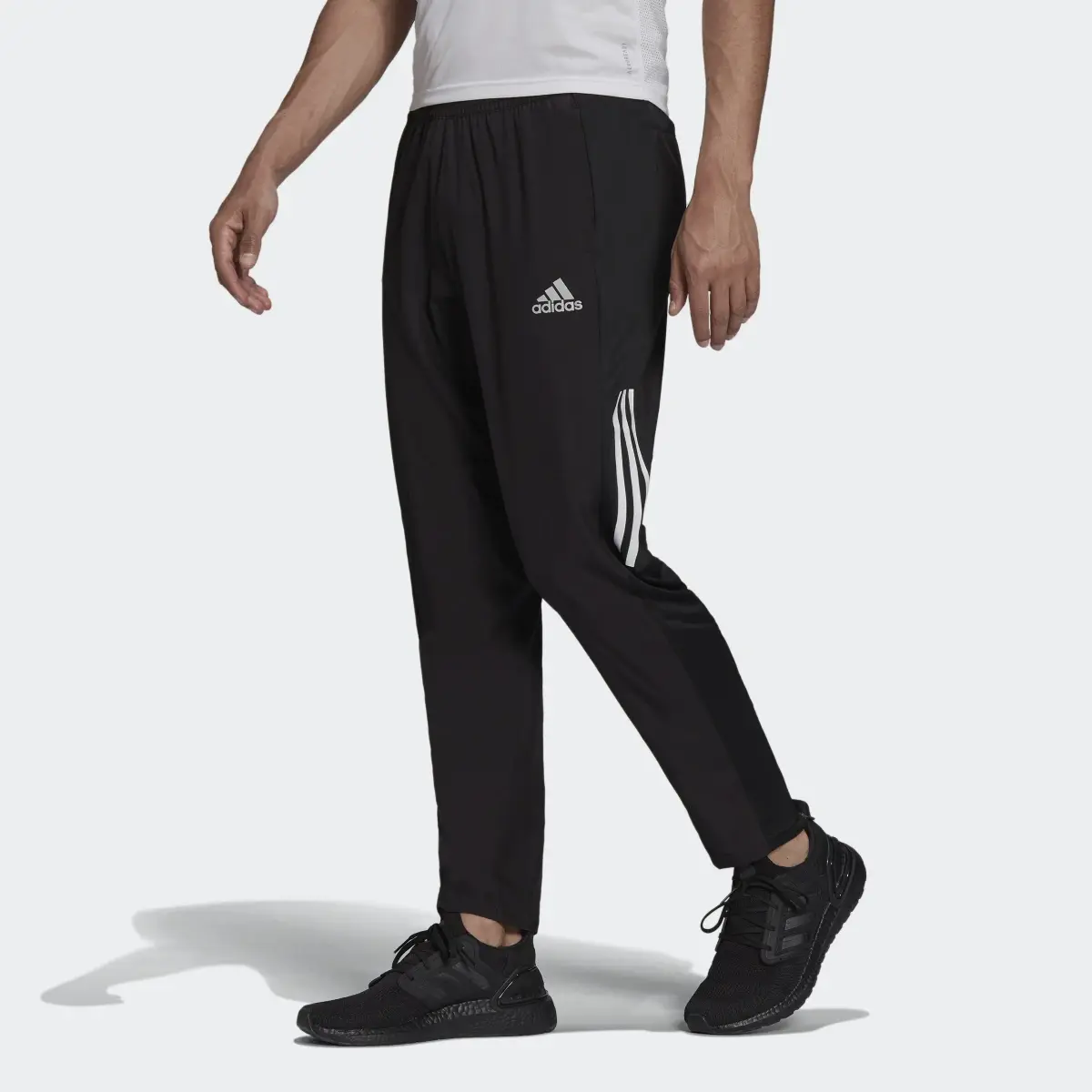 Adidas Own The Run Astro Wind Pants. 1