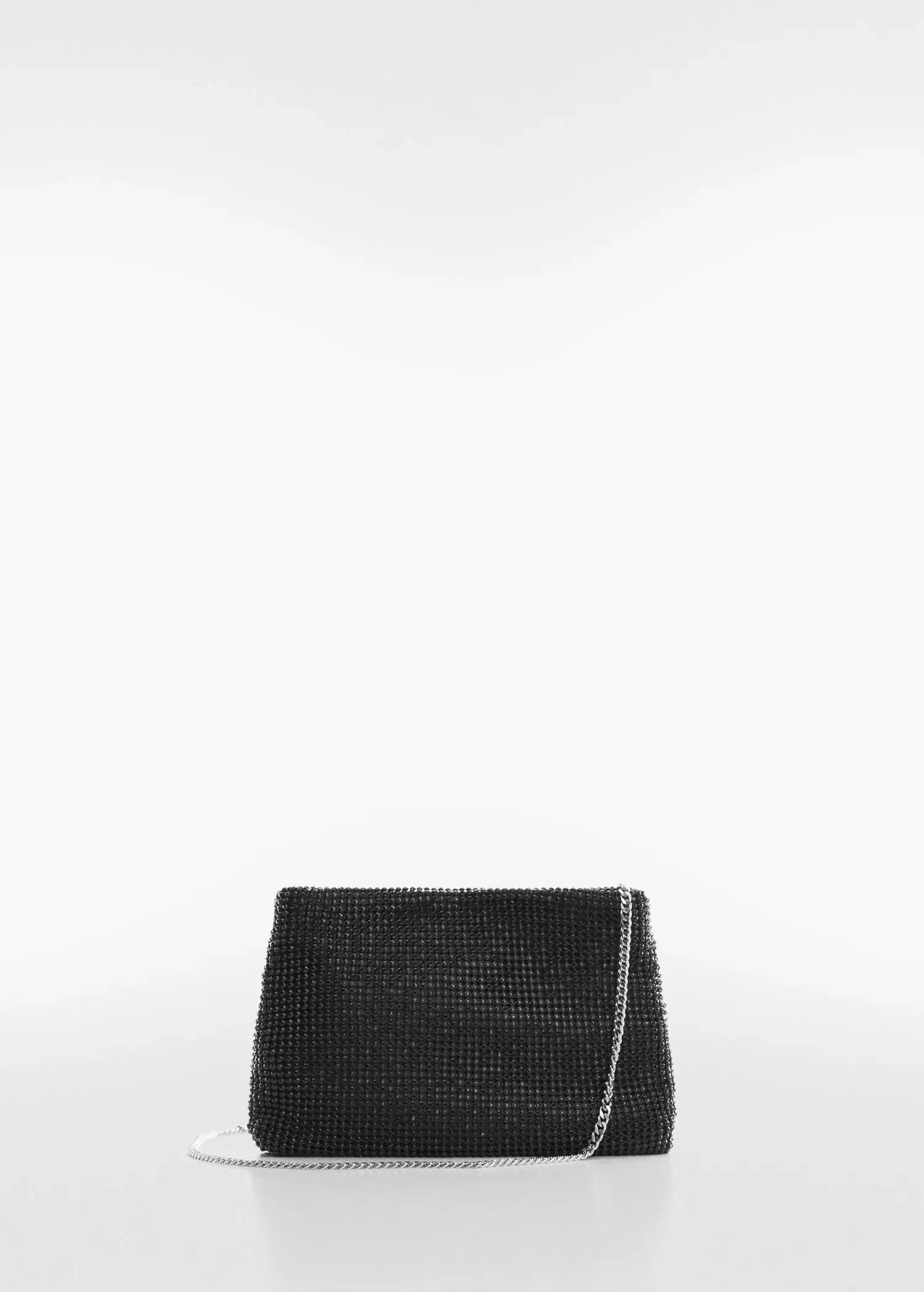 Mango Rhinestone chain bag. a black purse sitting on top of a white table. 
