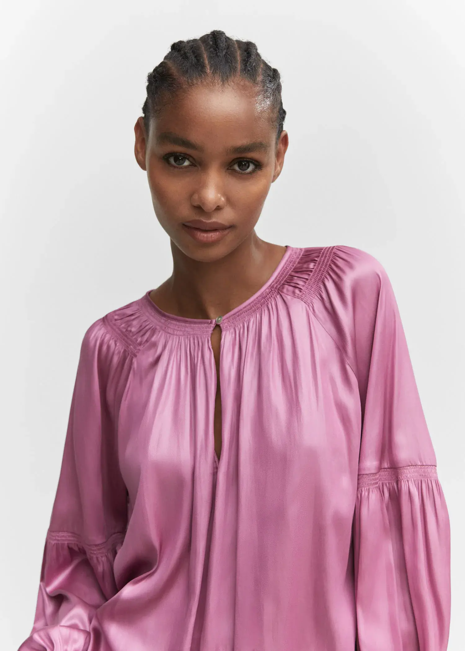 Mango Pleated blouse with button. 1
