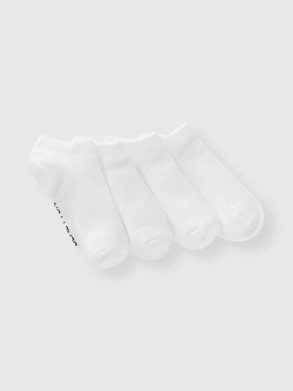 Benetton four pairs of short socks. 1